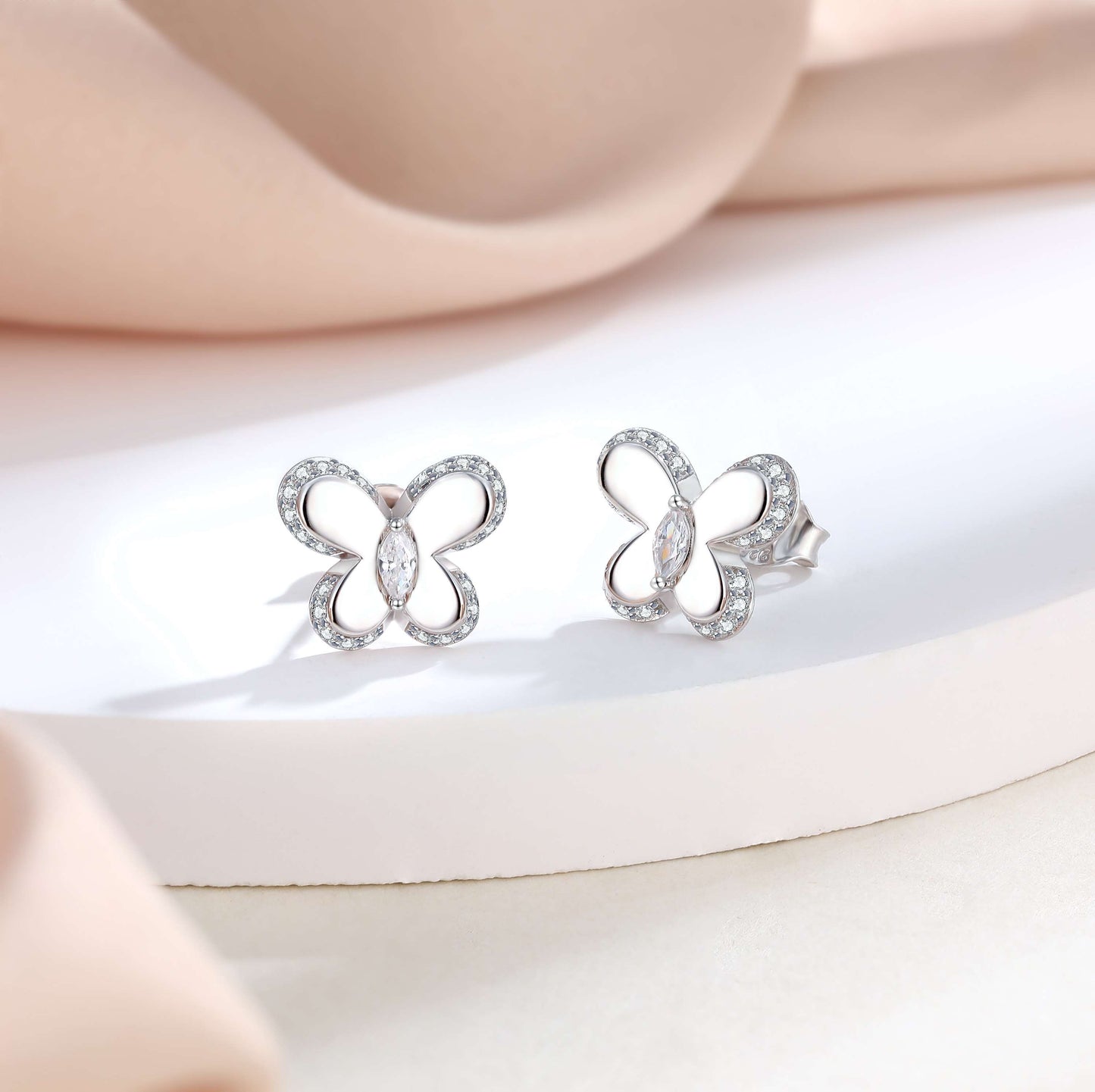 Butterfly Shaped Silver Studs with a CZ Stones inside and on the perimeter