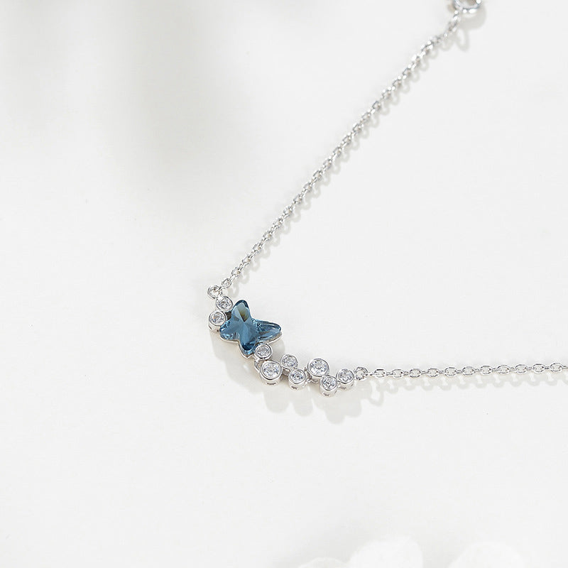 Sleek Bracelet with Blue Butterfly Pendant