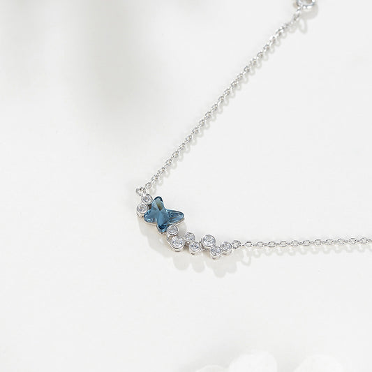 Sleek Bracelet with Blue Butterfly Pendant